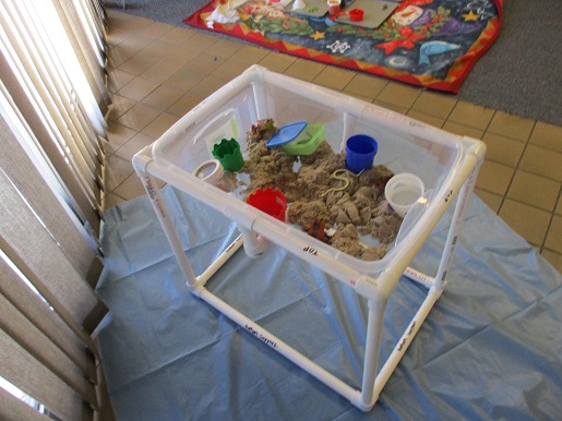 the sand box used for feeling and touching texture.